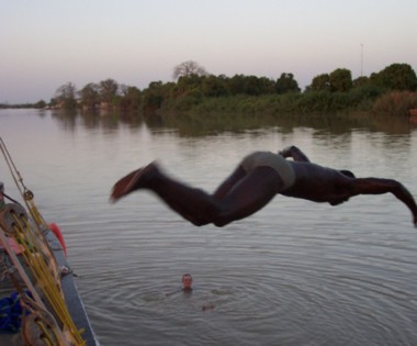 Swimming in the River Gambia off the Side of the Boat
  * (Kuntaur is just in the distance)