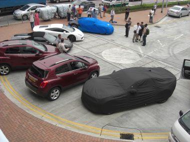 Supercars...Is that Bumblebee under a cover?