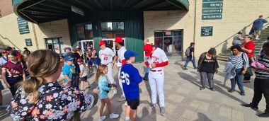 Team Signing Balls Outside